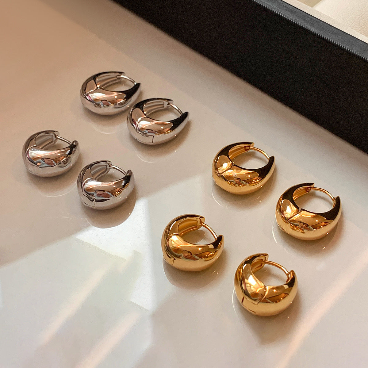 Metal droplet earring clasp