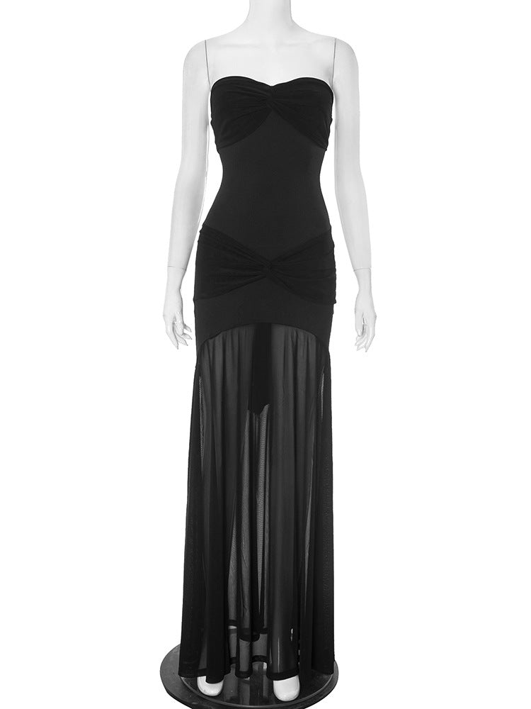 Form-fitting hip-hugging pleated strapless long dress