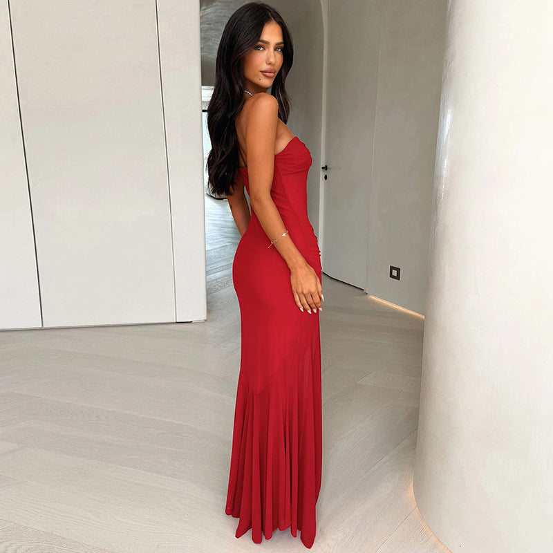 Form-fitting hip-hugging pleated strapless long dress